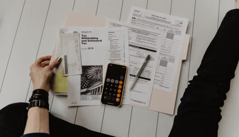 Small business bookkeeping desk with financial documents