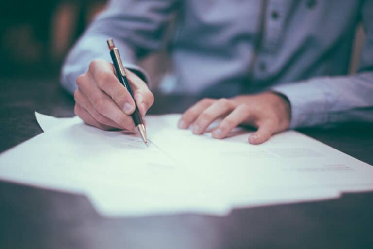 Small business owner reviewing documents