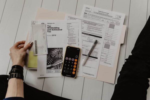 Small business bookkeeping desk with financial documents