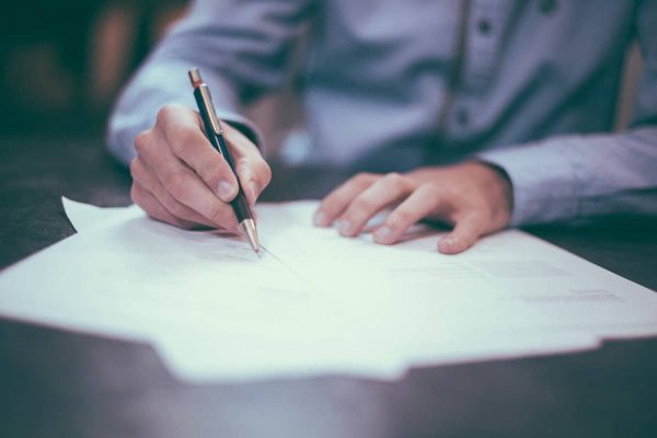 Small business owner reviewing documents